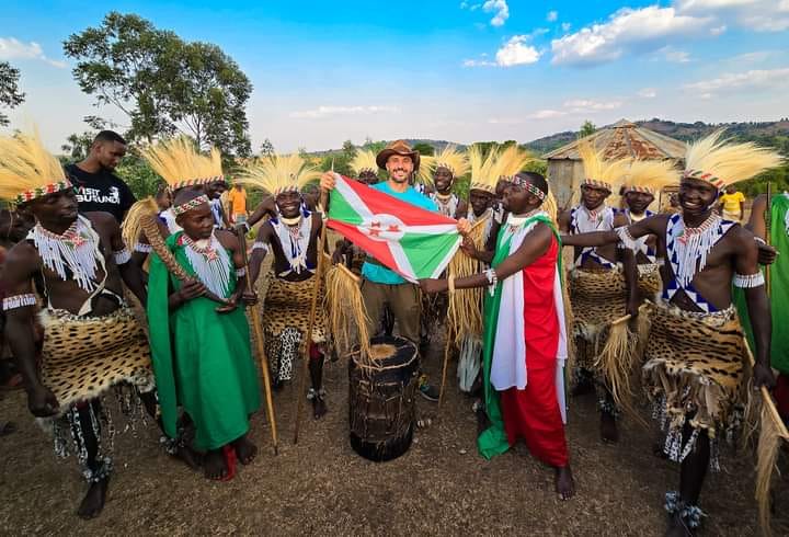 Drummers performing with the Burundi flag