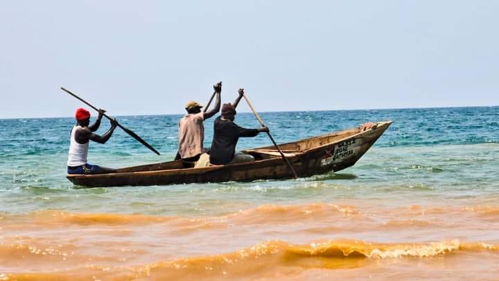 Fishermen on a wooden boat on Lake Tanganyika