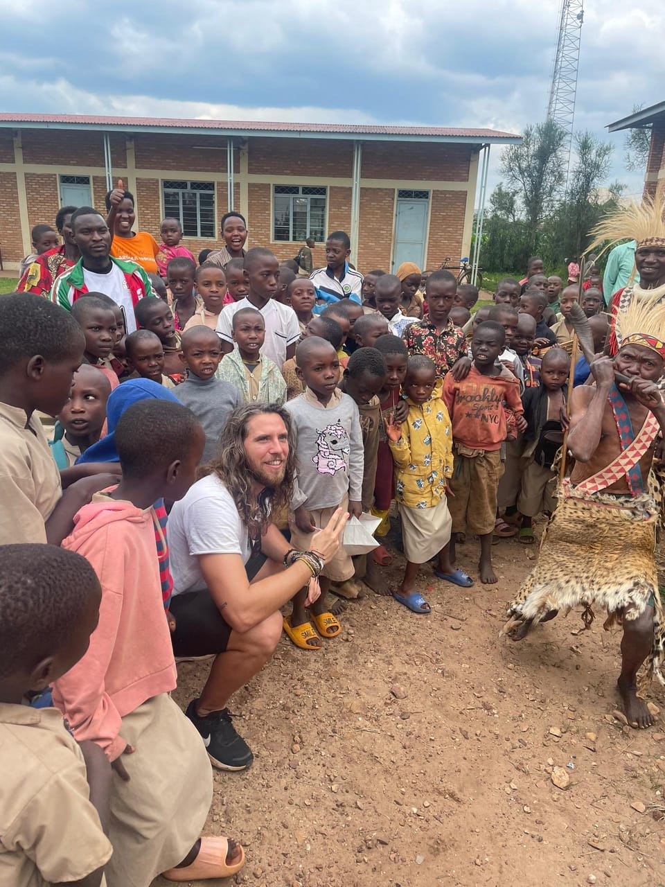 Traveller meeting children during a village visit